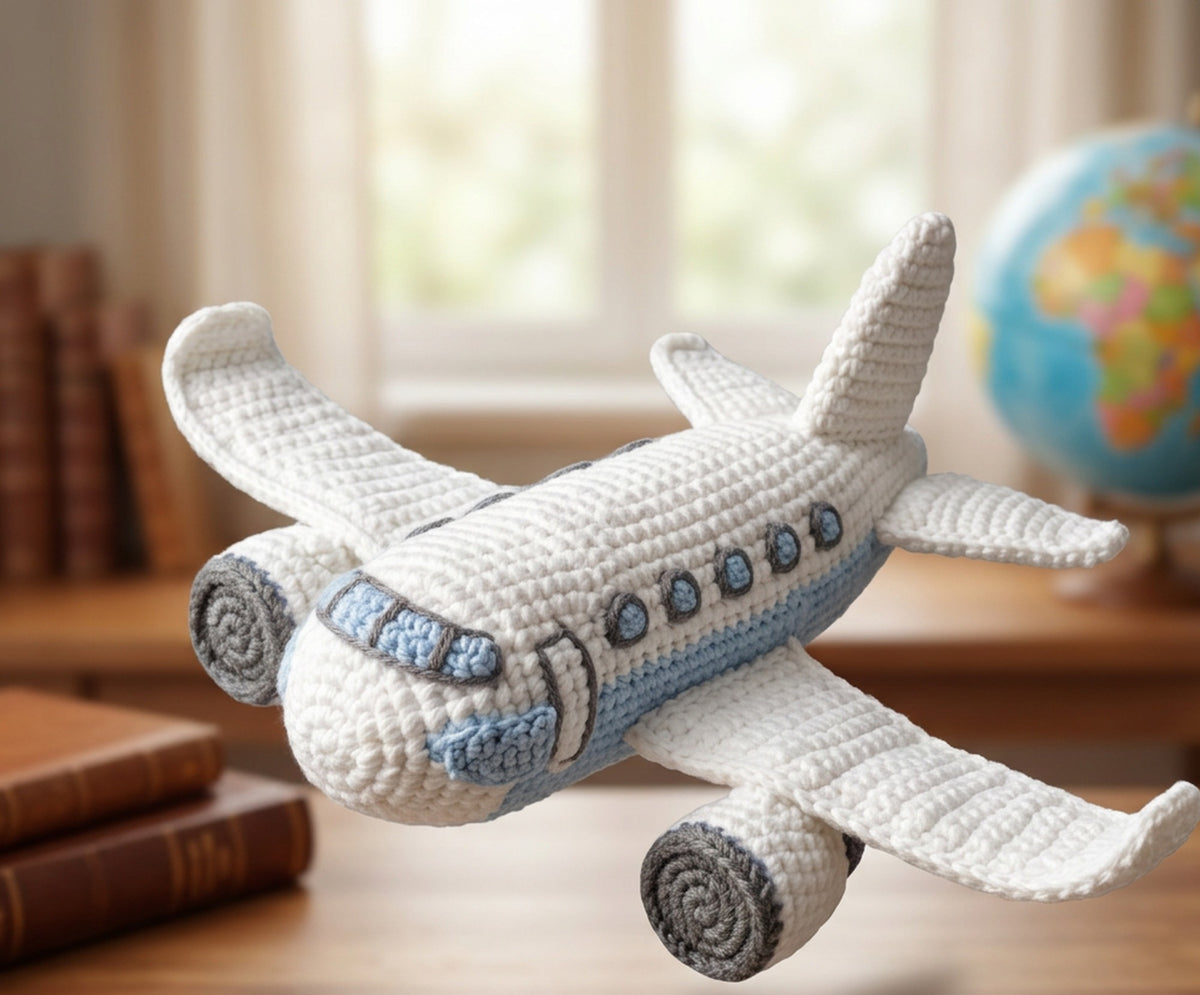 Crochet passenger plane amigurumi, soft plush aeroplane made from a downloadable crochet pattern