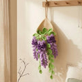 Crochet teardrop wall pot with trailing purple lavender hanging against a wall