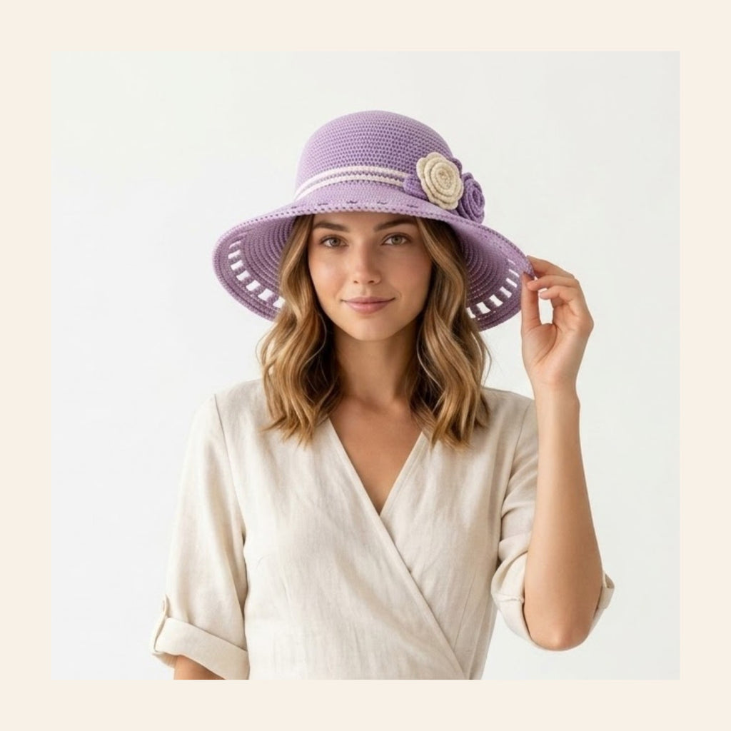 Crochet summer sun hat in lilac paper raffia with a cream rose on the band
